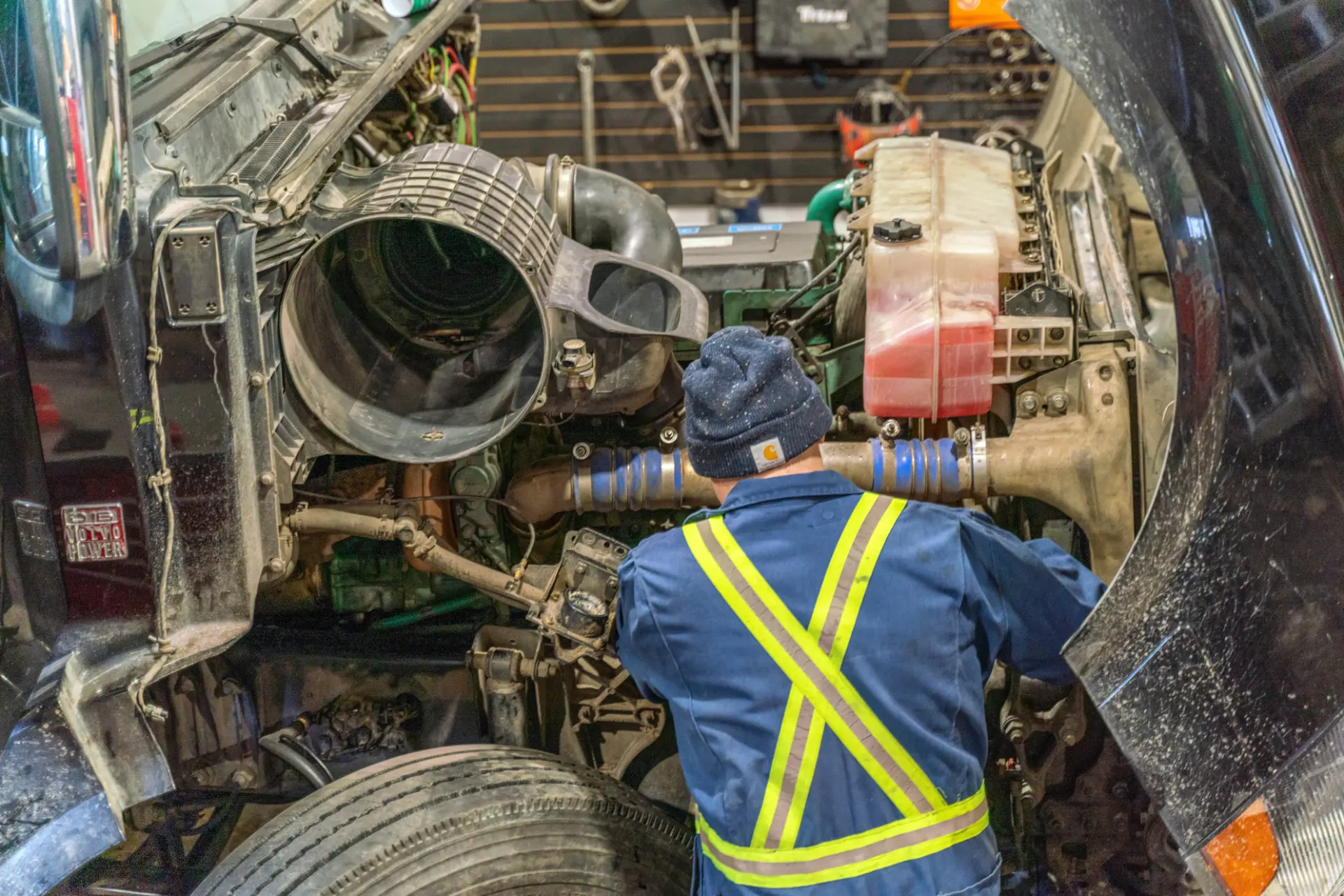 Mechanic performing truck repairs in Edmonton, AB