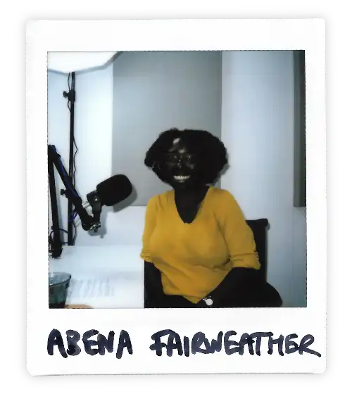 Polaroid of Albena Fairweather in the Oxford Podcast Studio sat at the table with a microphone.