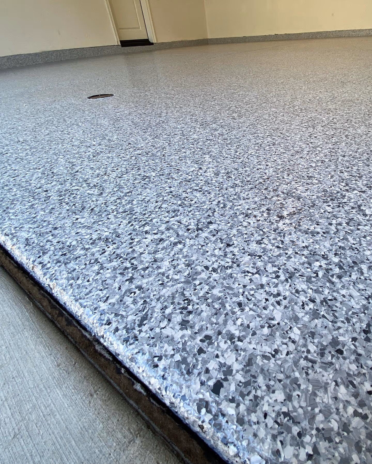 Grey and white epoxy garage floor