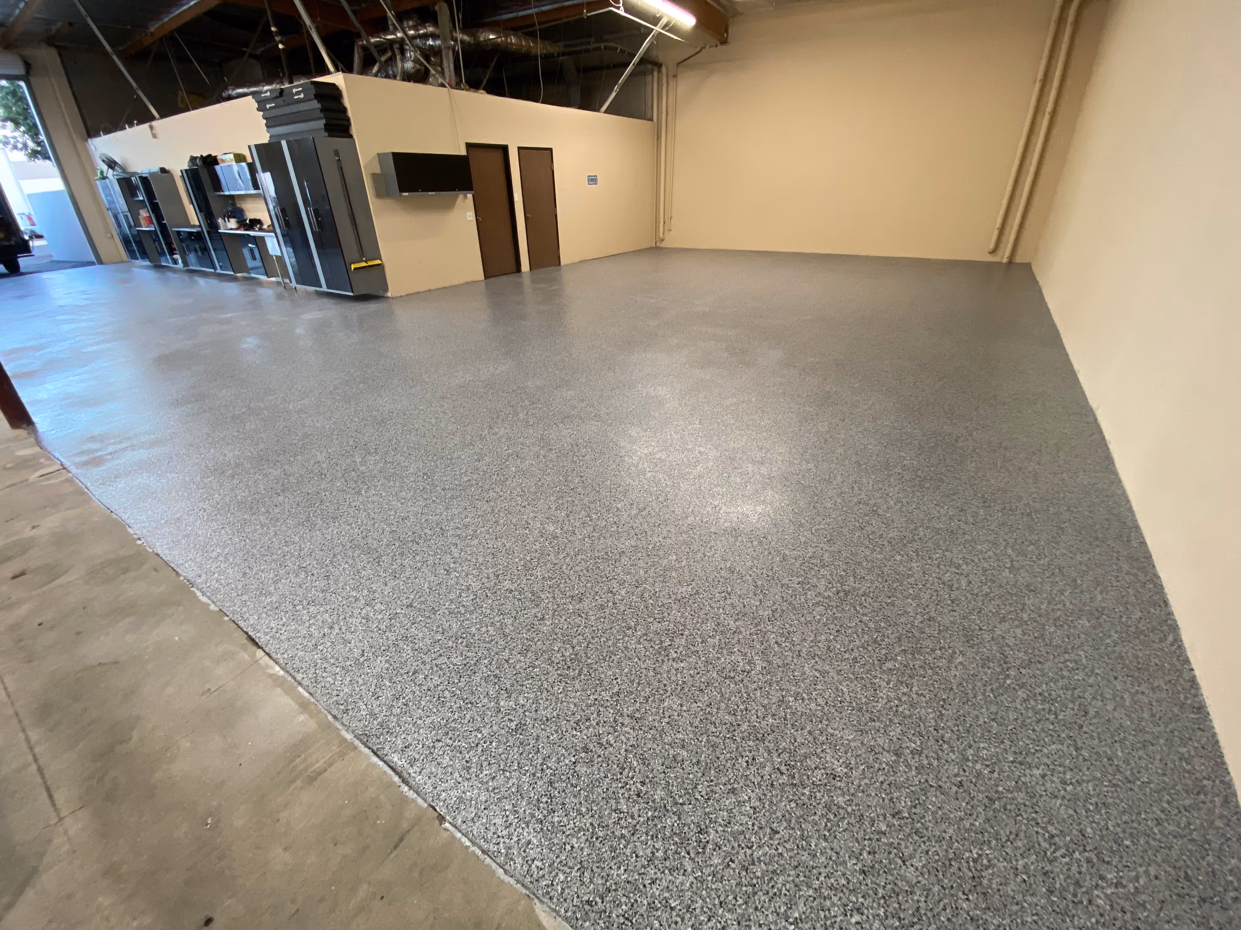 Grey epoxy flake floor in warehouse