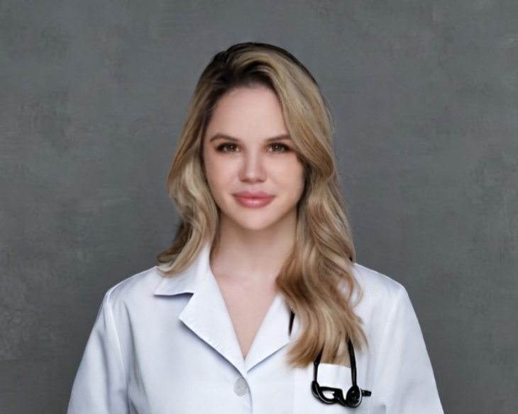An image of Elena Gouzenkova, a registered nurse and clinic manager at Wellness Haus.
