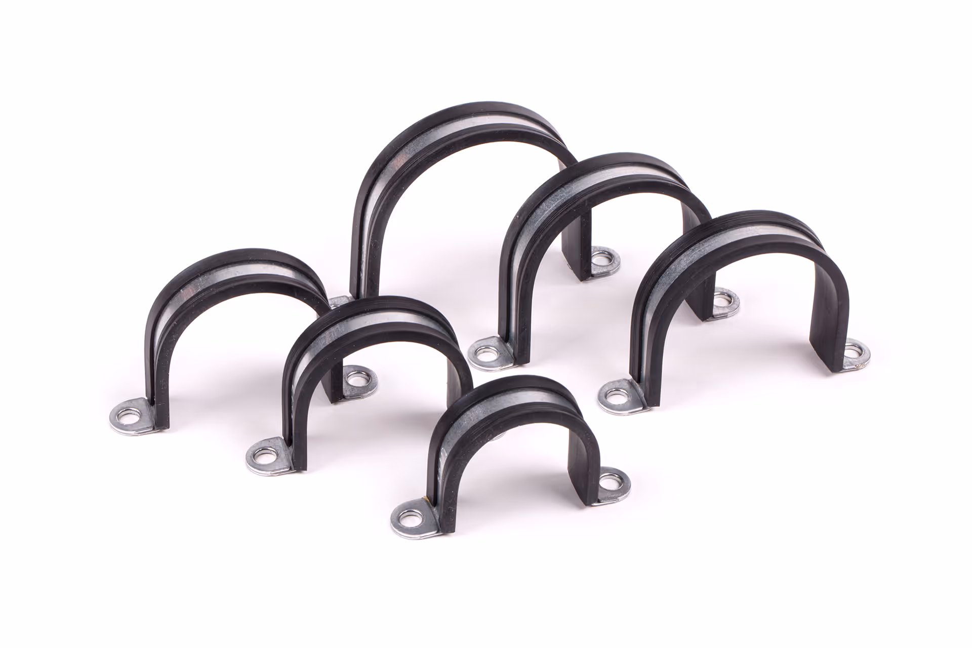 Pipe clamps made of zinc-plated steel with elastomer insert.