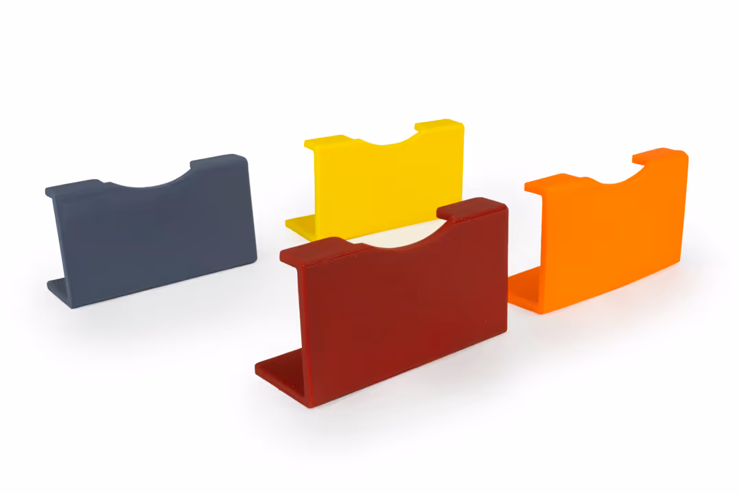 Värikoodit Michel Vario-Tisch , keltaisena, tummanpunaisena ja oranssina.