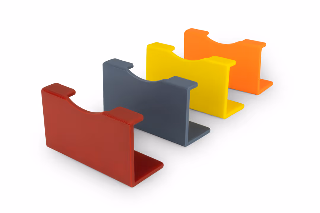 Värikoodit Michel Vario-Tisch , tummanharmaana, keltaisena ja oranssina.