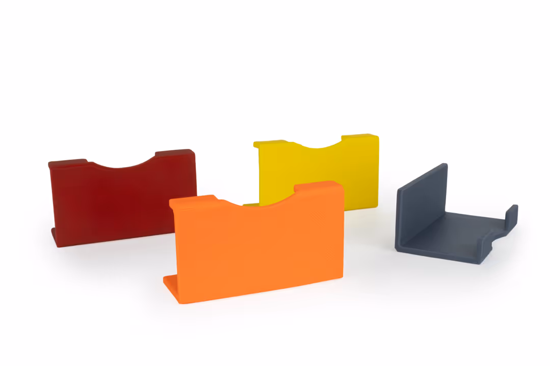 Värikoodit Michel Vario-Tisch , keltaisella, oranssilla ja tummanharmaalla.