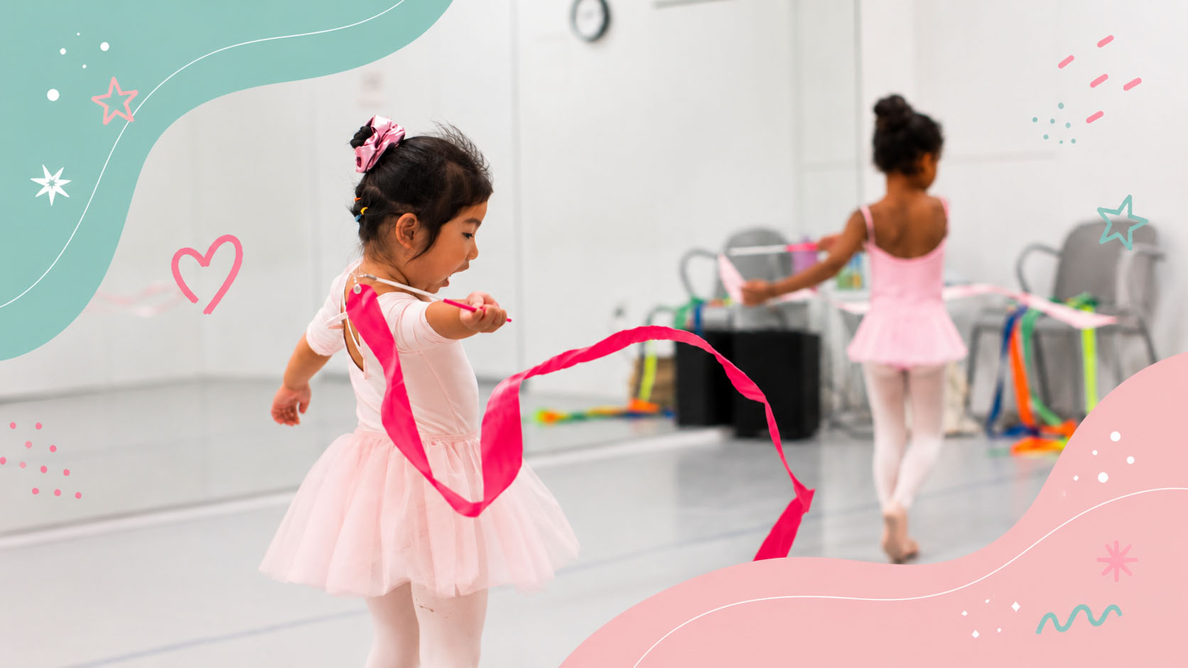 Children practicing ballet with pink ribbons