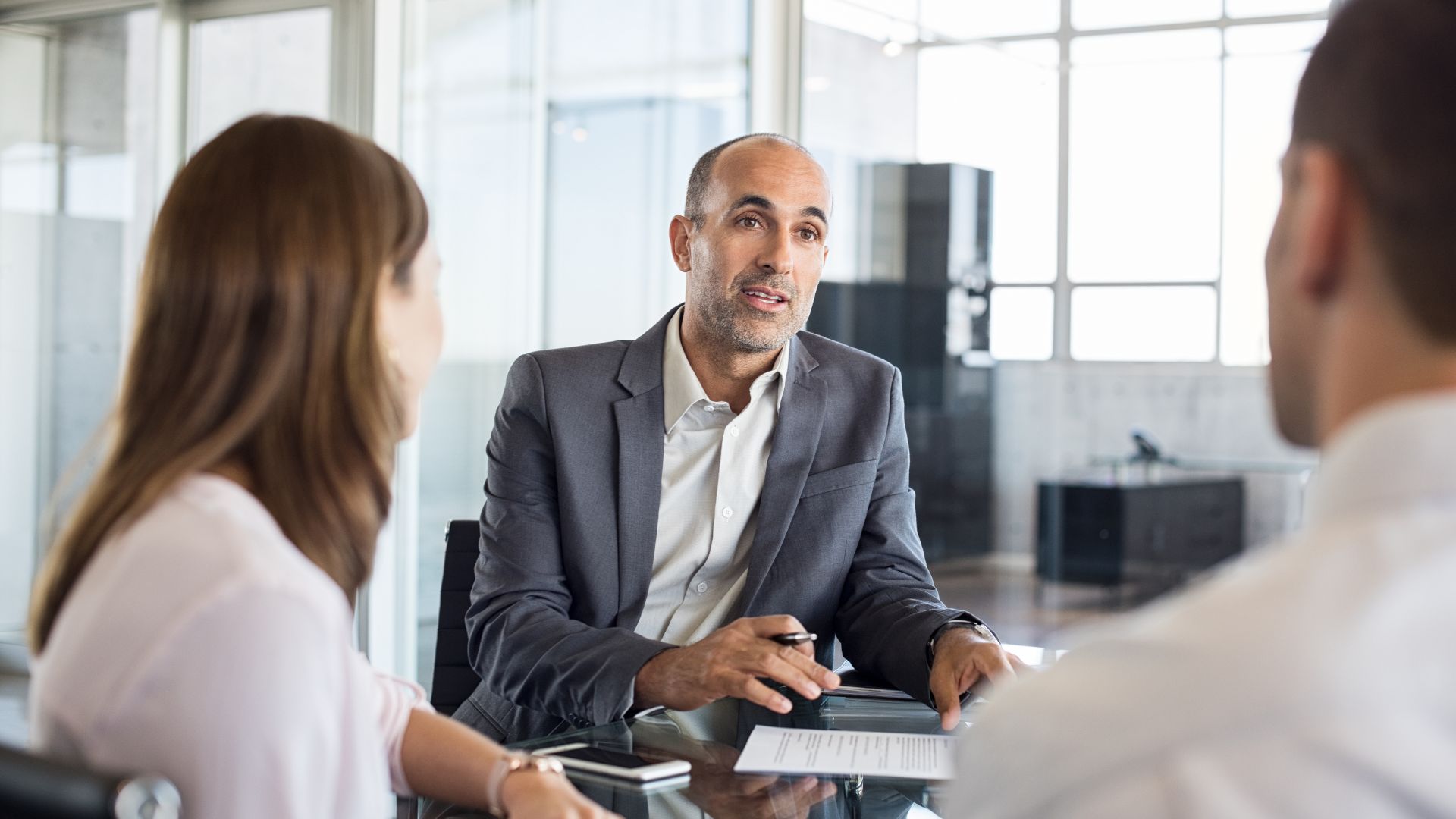 Rudy talks to clients