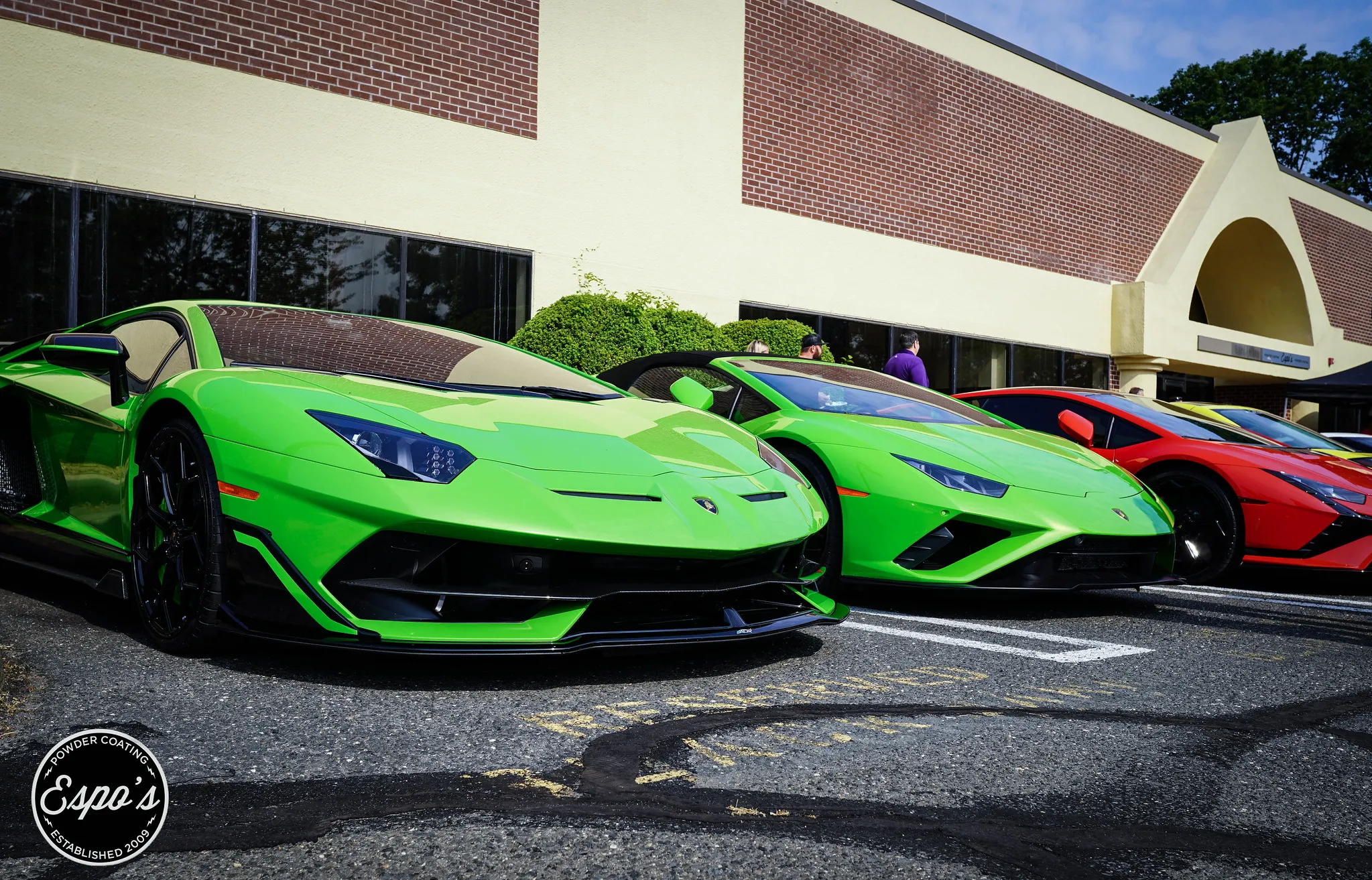 Lamborghinis lined up outside a car meet, powder coating news from Espo's