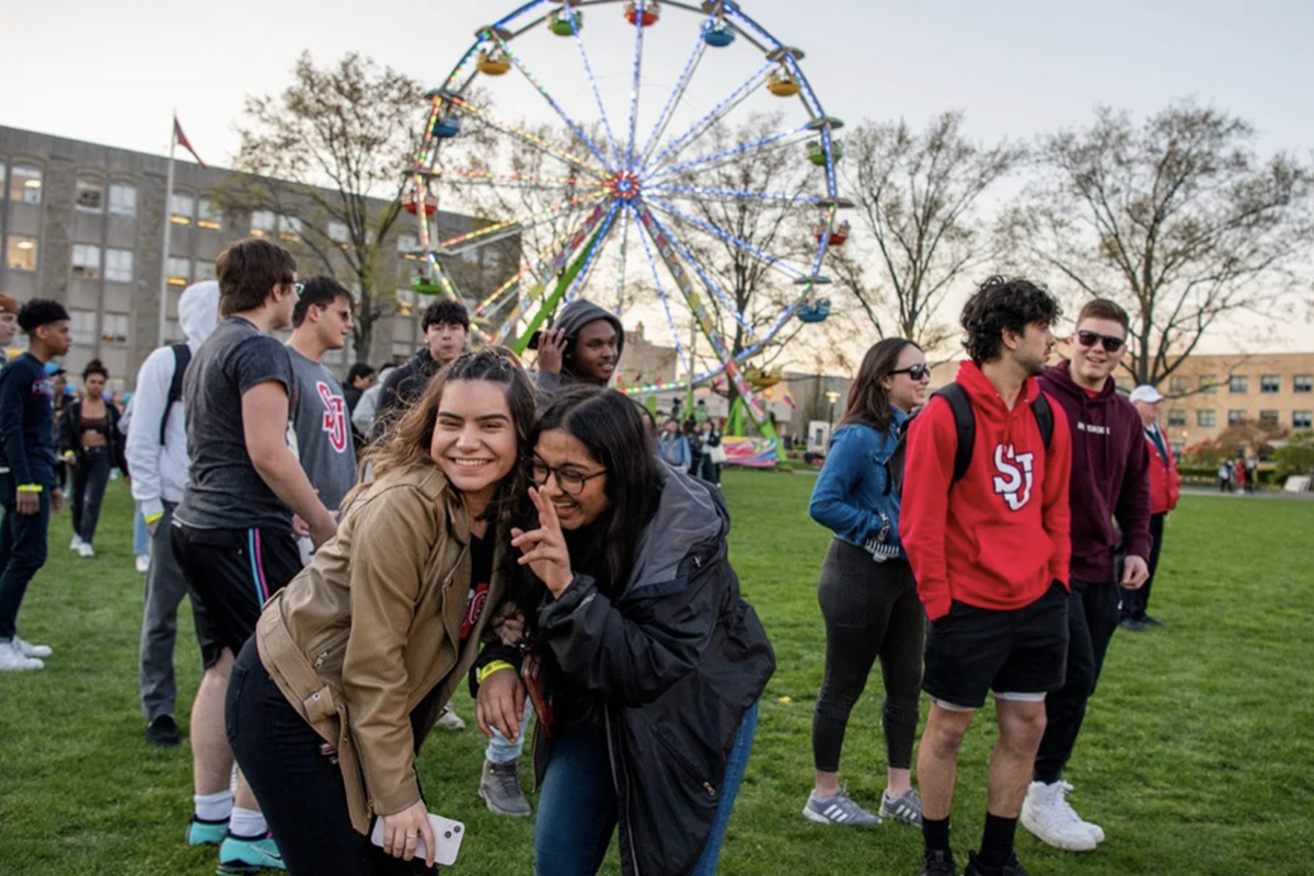 Festival guests with Ferris wheel