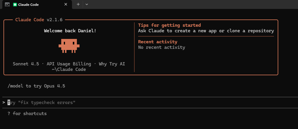 Claude Code terminal welcome screen showing version v2.1.6, tips for getting started, recent activity, and a prompt to try Opus 4.5.