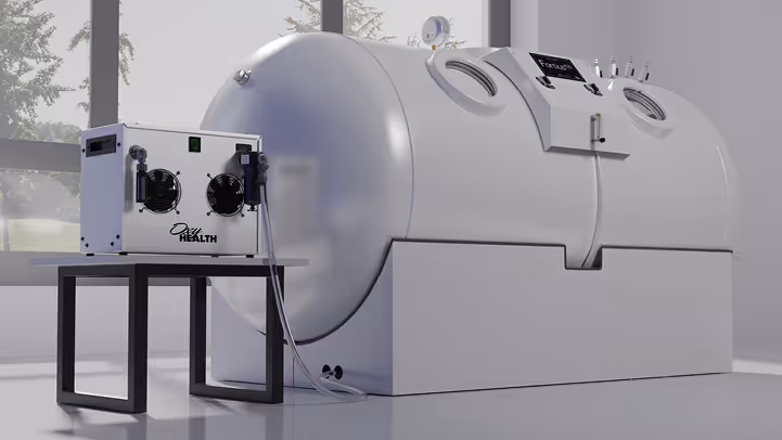 Modern Fortius 420 hyperbaric oxygen therapy chamber with control unit on stand in a bright room.