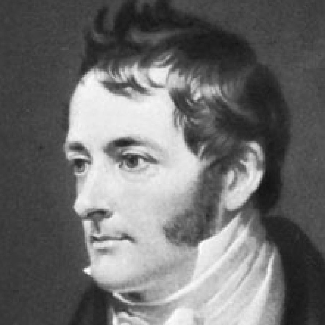 Portrait of William Henry with styled hair and sideburns wearing a high-collared shirt and cravat.