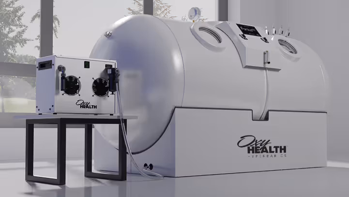 Modern Fortius 420 hyperbaric oxygen therapy chamber with control unit on stand in a bright room.