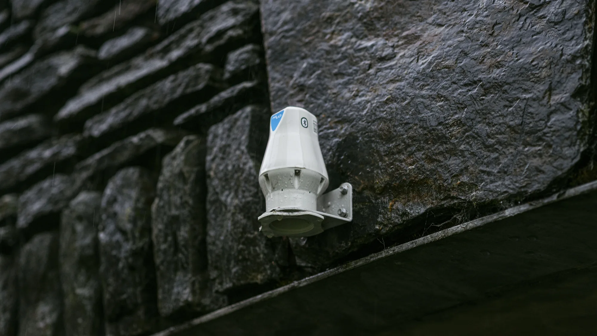 HiLo LS1-R mounted on a stone culvert wall in the rain