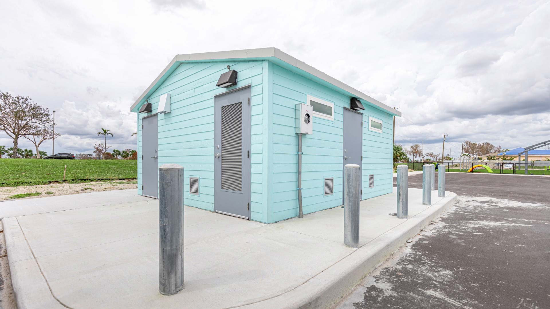 Custom precast concrete building with a light blue exterior