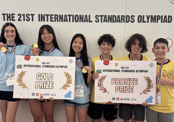Team Australia celebrates an historic debut at the 21st International Standards Olympiad  