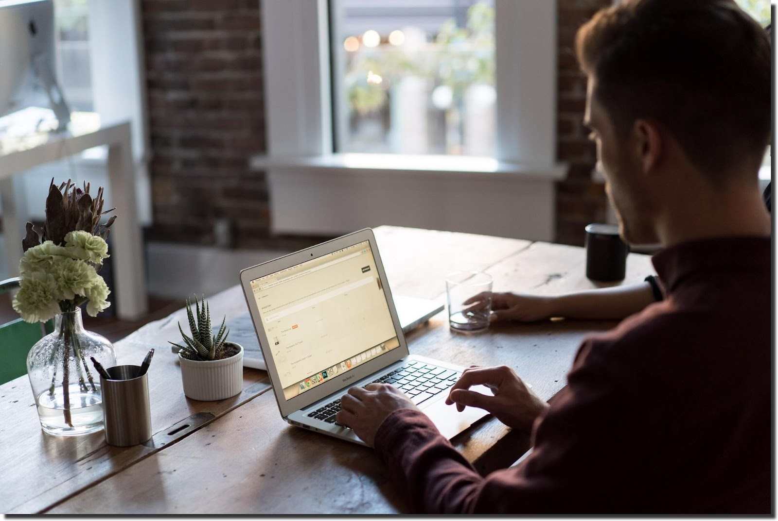 person-working-on-laptop-on-a-table