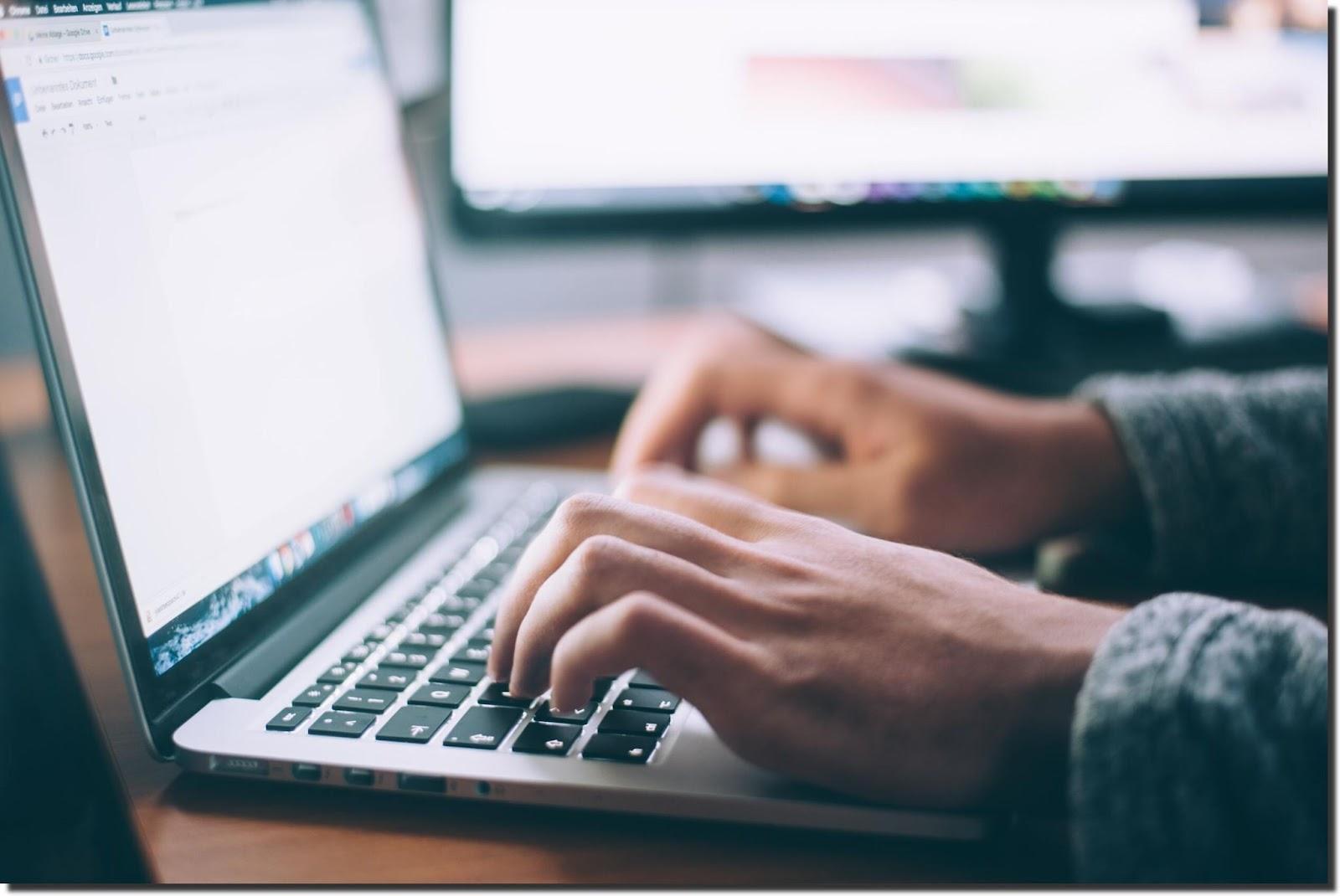 person-typing-on-laptop