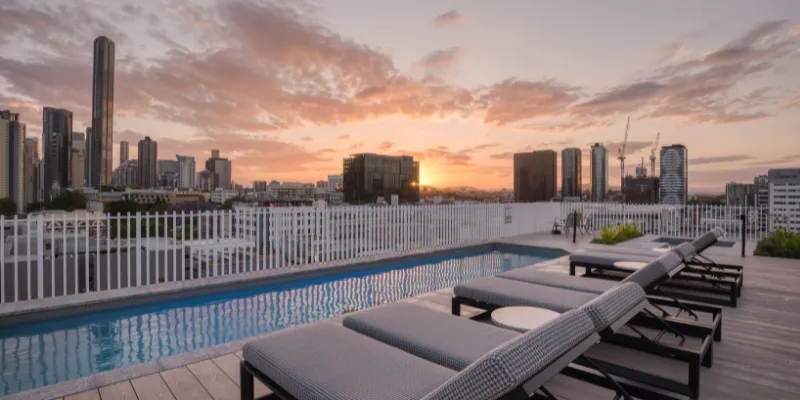 Rooftop pool with city views at Rambla Serviced Apartment