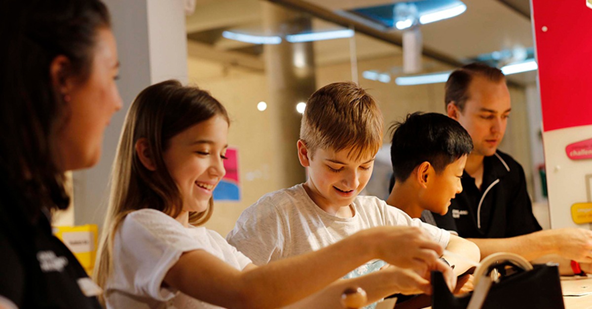 Kids enjoying a SparkLab activity at Queensland Museum