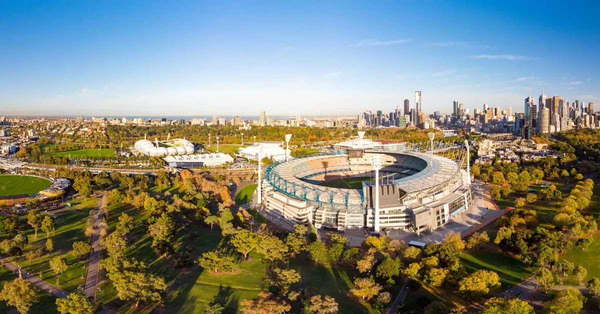 Aerial view of the Melbourne Cricket Ground (MCG) and Melbourne city skyline