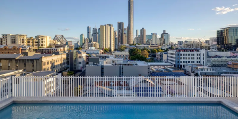 Berwick House Rooftop pool overlooking a city skyline, Brisbane, Australia