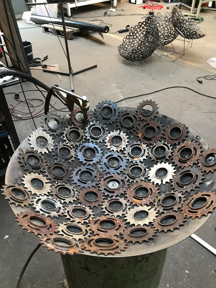 Photo of artwork Matter of Life by Marisja Smit. Making off photo, detail of mould used for welding repurposed steel gears. 