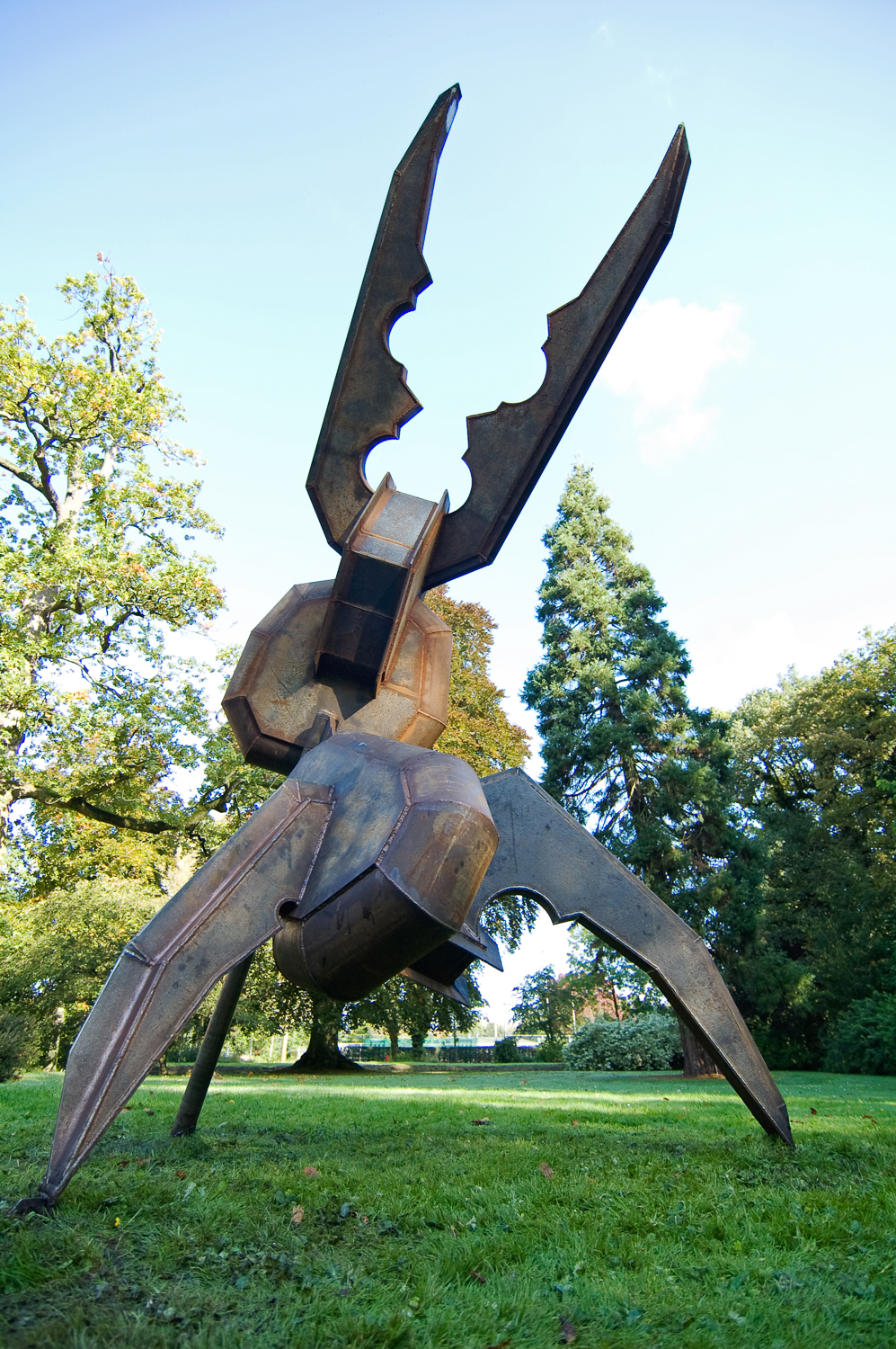 Steel Artwork by ATMosphere studio Amersfoort. Giant sculpture in sculpture garden made by sculptor Thijs Trompert out of Corten Steel in 2007. Perspective image by ATMosphere.