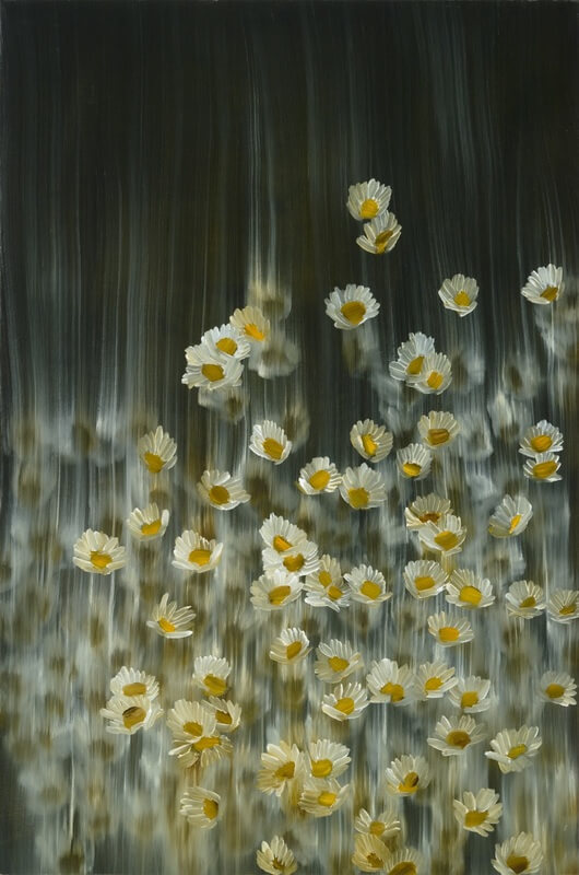 White daisies floating against blurred gray and green vertical background