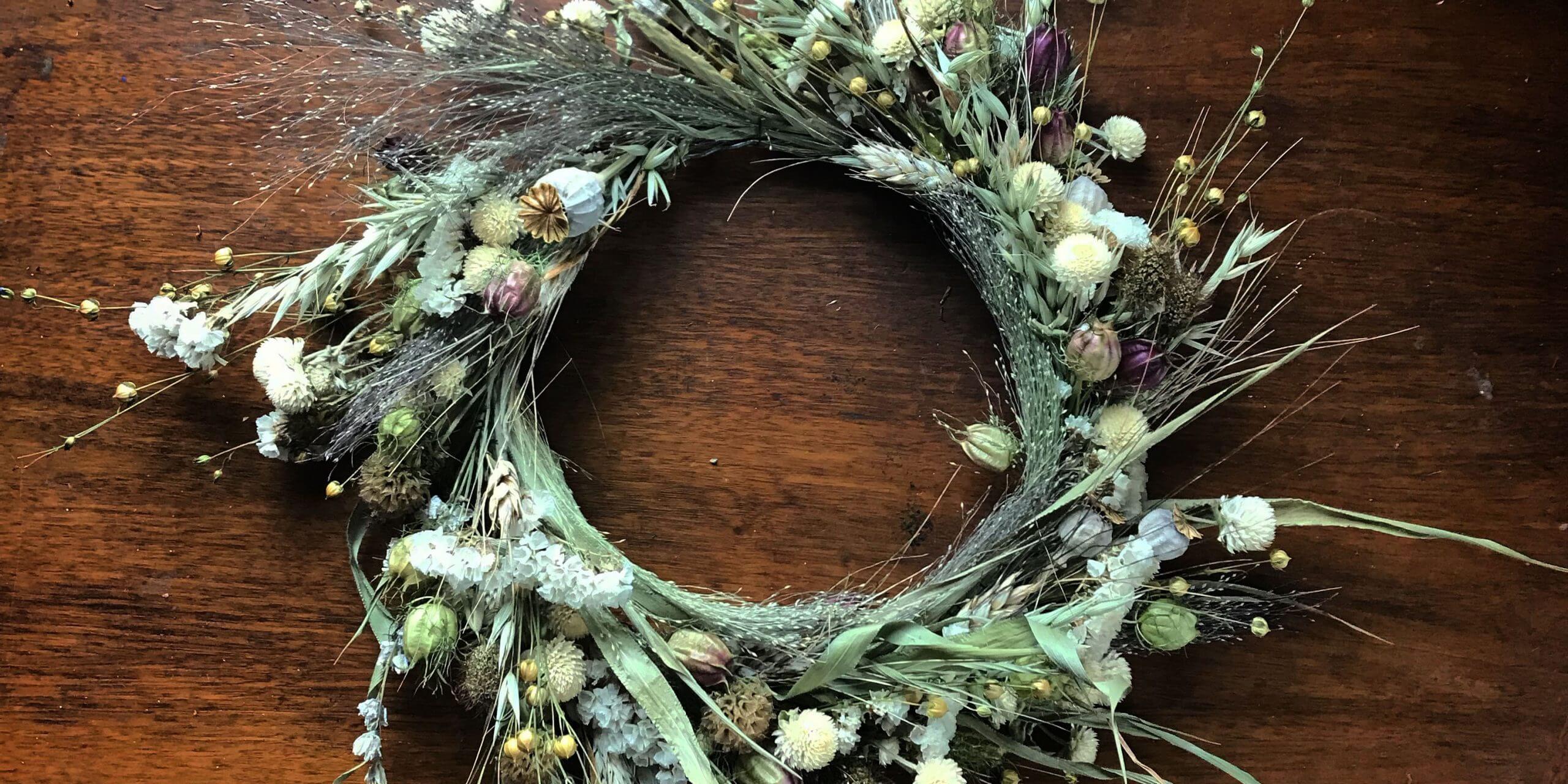 Rustic dried flower wreath with delicate grasses and soft muted colors