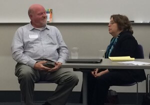 Patrick Ward (left) and Sarah Redfield in a mock negotiation