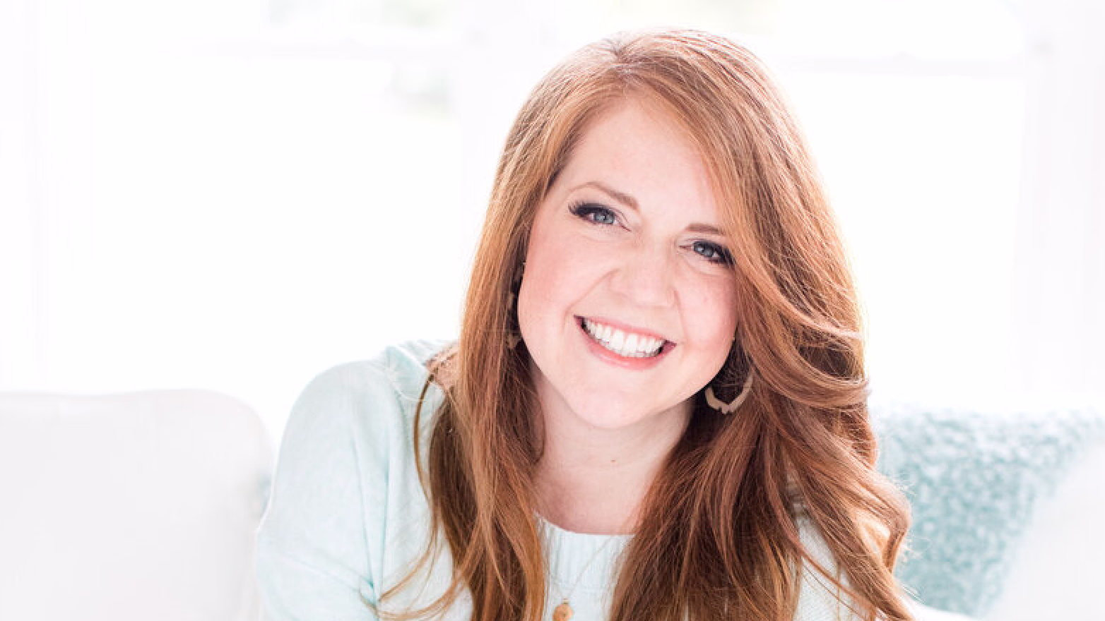 Woman with red hair smilling