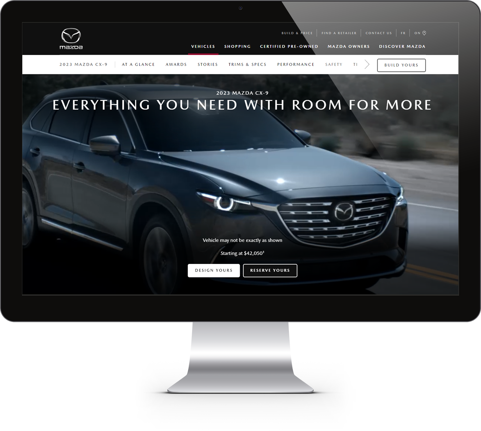 Computer screen displaying Mazda product page.