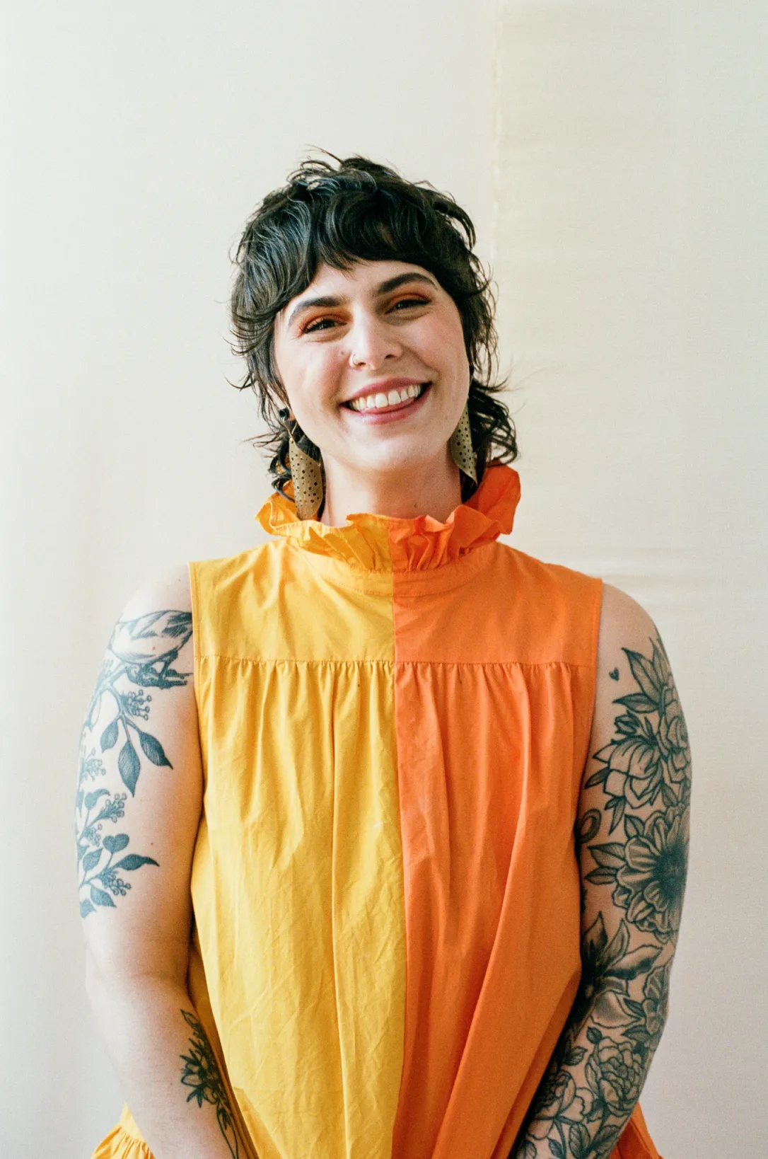 stylist fiona sits on couch in waiting area