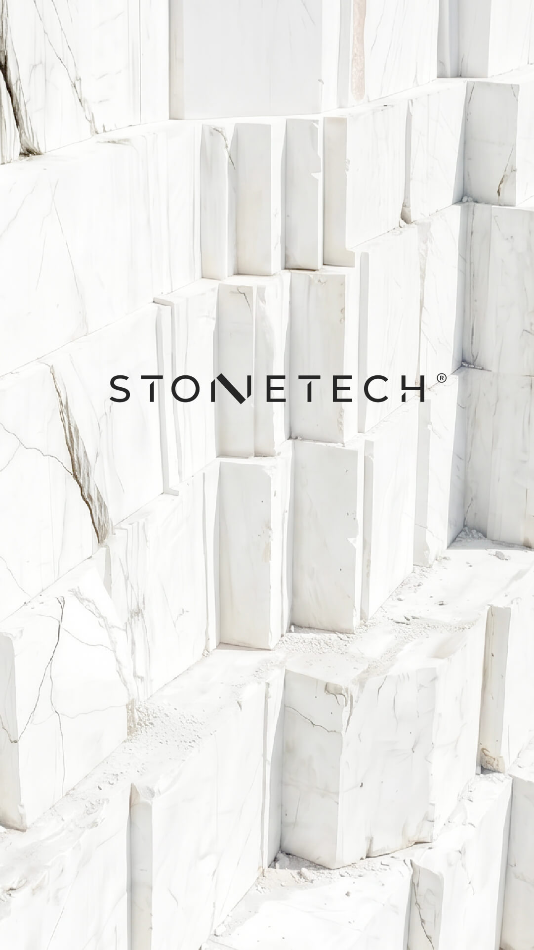 Stacked white marble blocks with subtle gray veining and the Stonetech logo centered — Stonetech by Lazy snail Design
