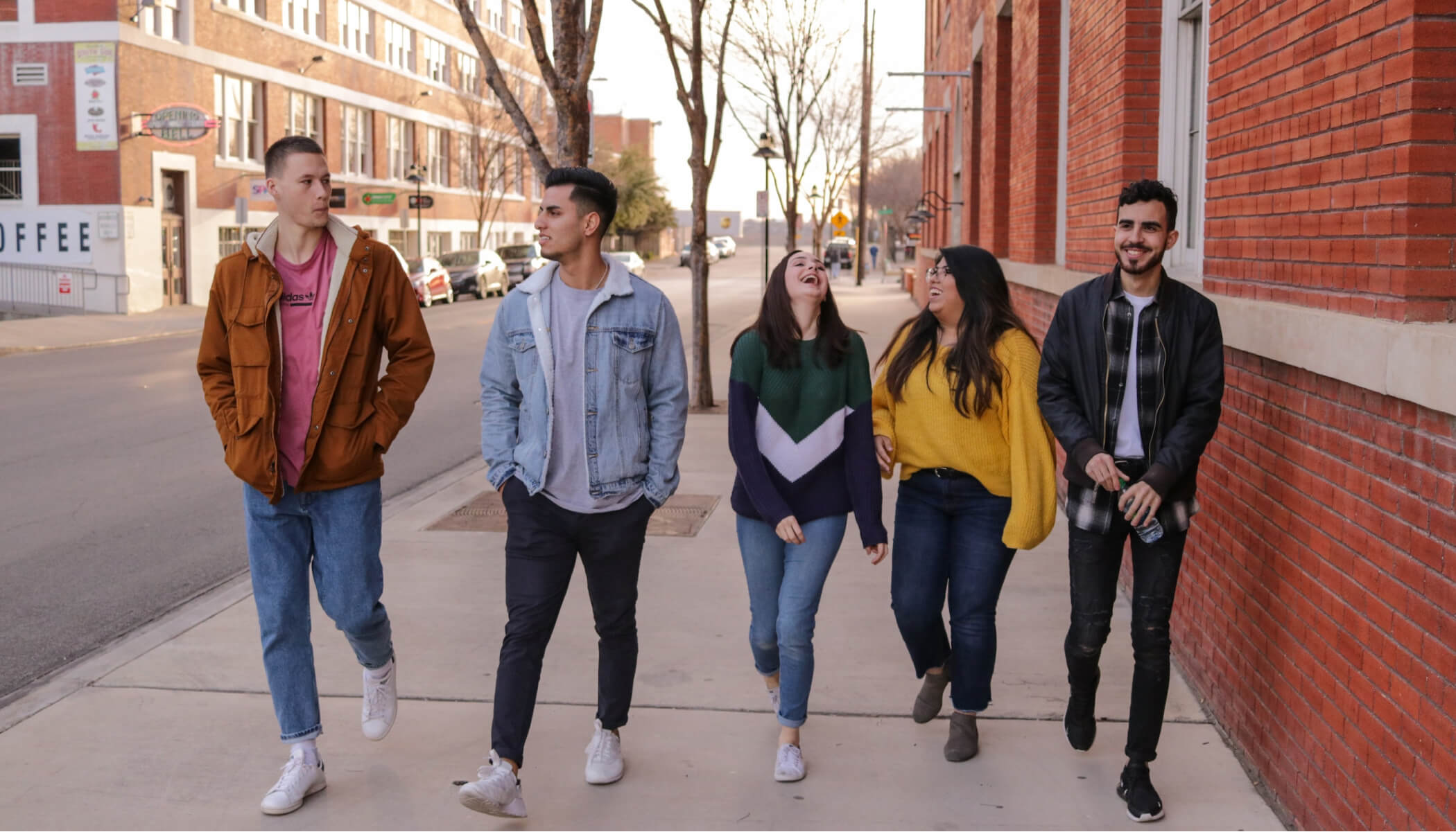 Group of friends walking down the street