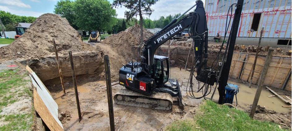 Driving steel piles using specialized machinery