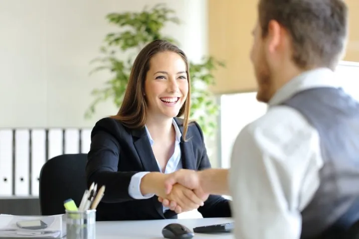 job interview for internship, two people handshake