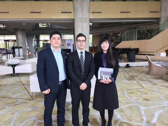 One of our interns in China with 2 colleagues