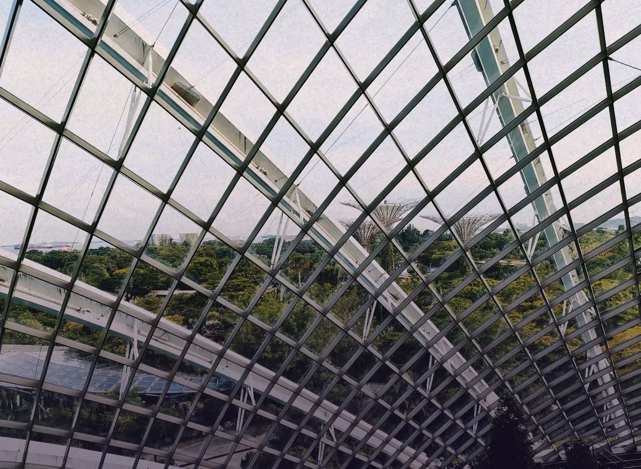 Compliance Check Thumbnail showing a building with trees in the background