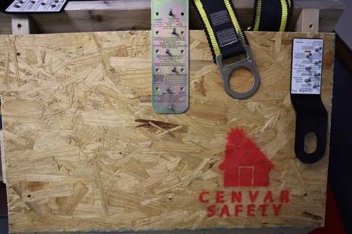 A wooden box with a rope attached to it.