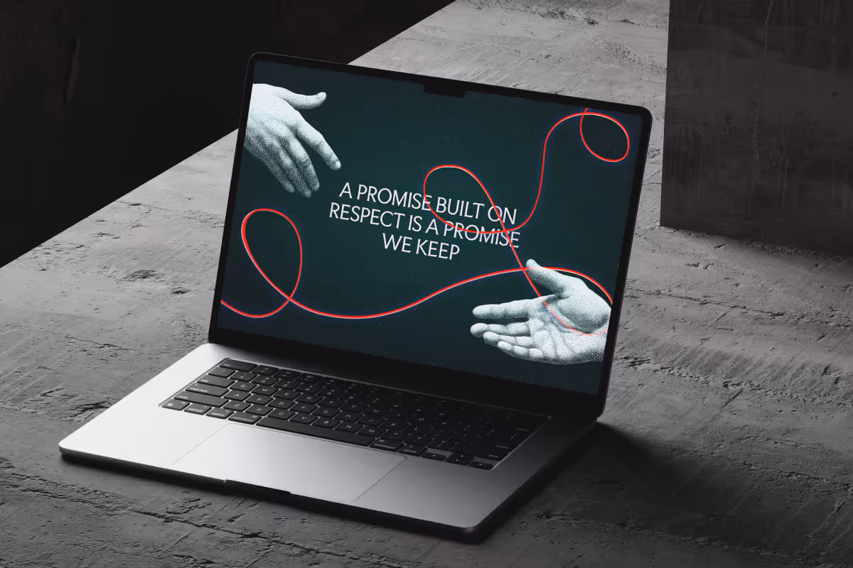 Open laptop displaying two illustrated hands reaching toward each other connected by a red string and the text 'A promise built on respect is a promise we keep.'
