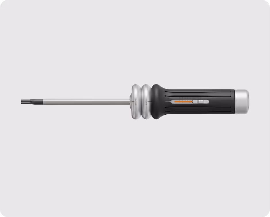 A black and silver screwdriver with a textured grip and a metallic shaft on a gray background.