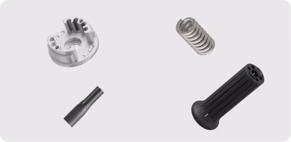 Four mechanical parts including a metal spring, black knob, small metal piece, and round metallic component.