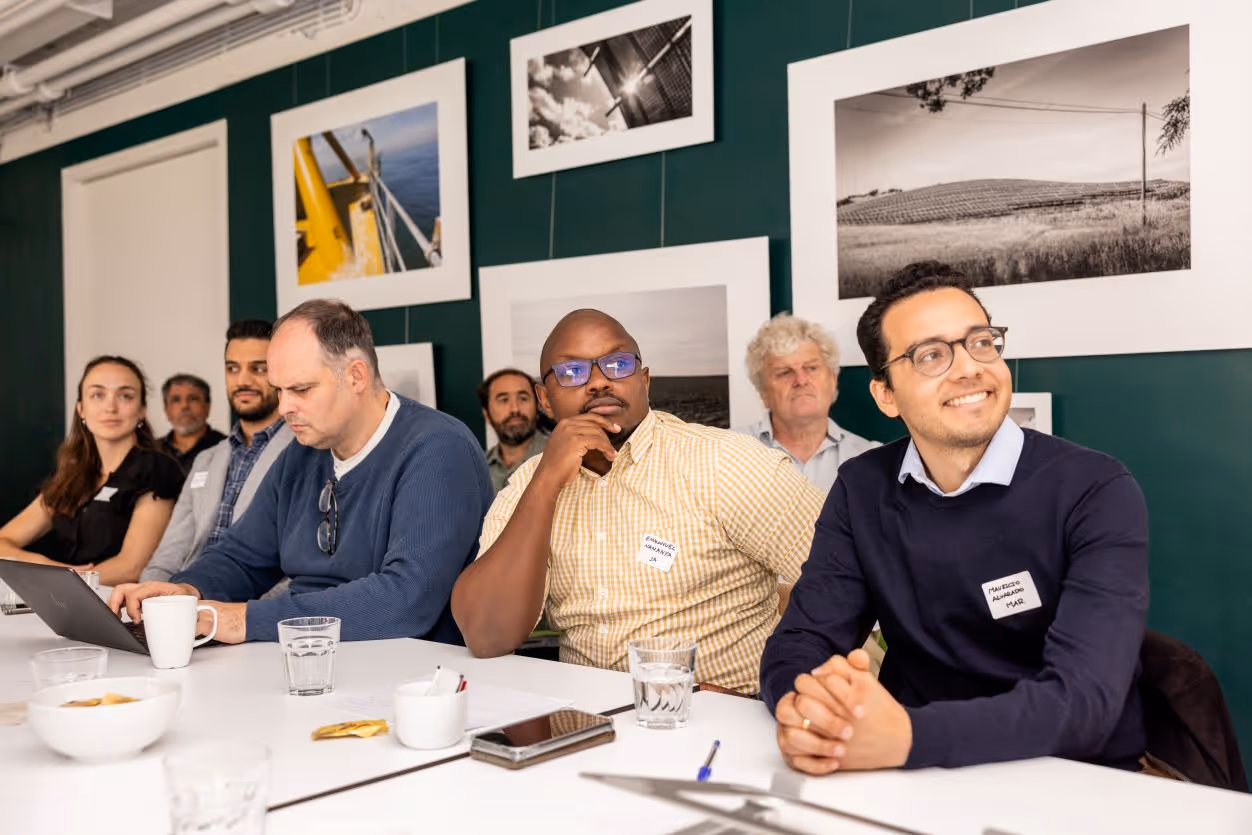 Picture of 3E energy advisory services experts during a meeting