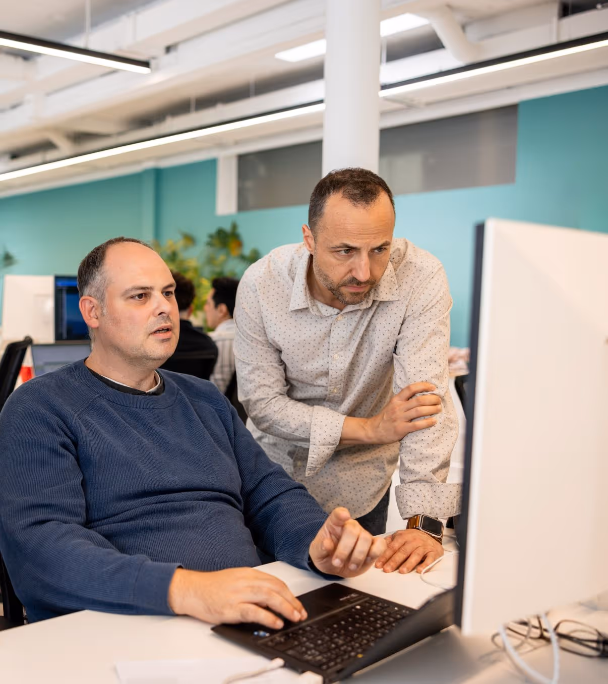 Picture of 3E's energy advisory services experts working