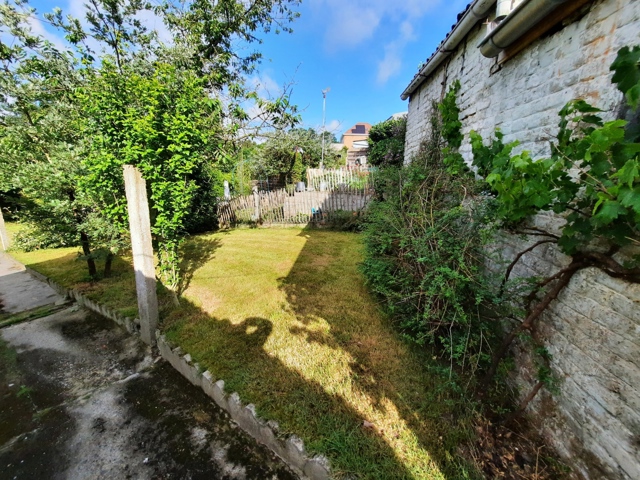 Maison 2 chambres avec beau jardin