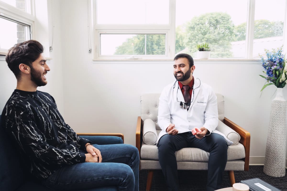 Dental implant consultation at Opal Dental Group showing treatment options and patient care