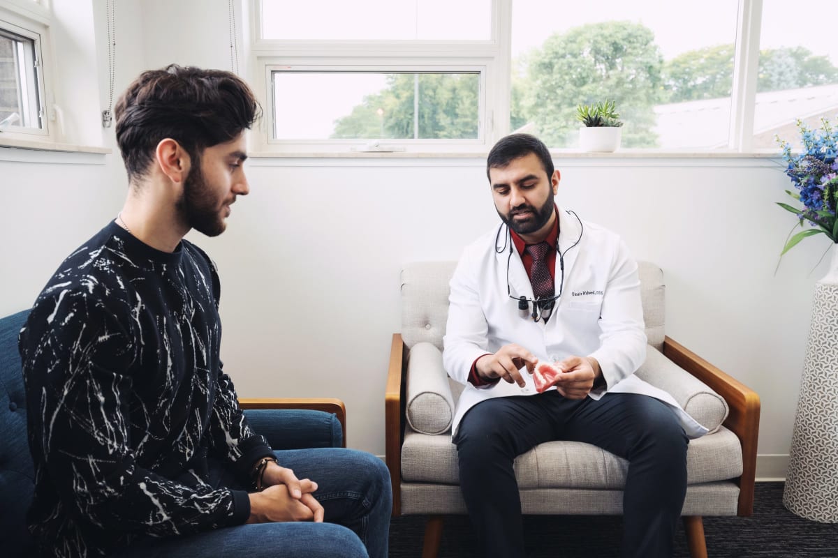 Dental crown procedure discussion with Patient at Opal Dental Group in Macomb, Michigan