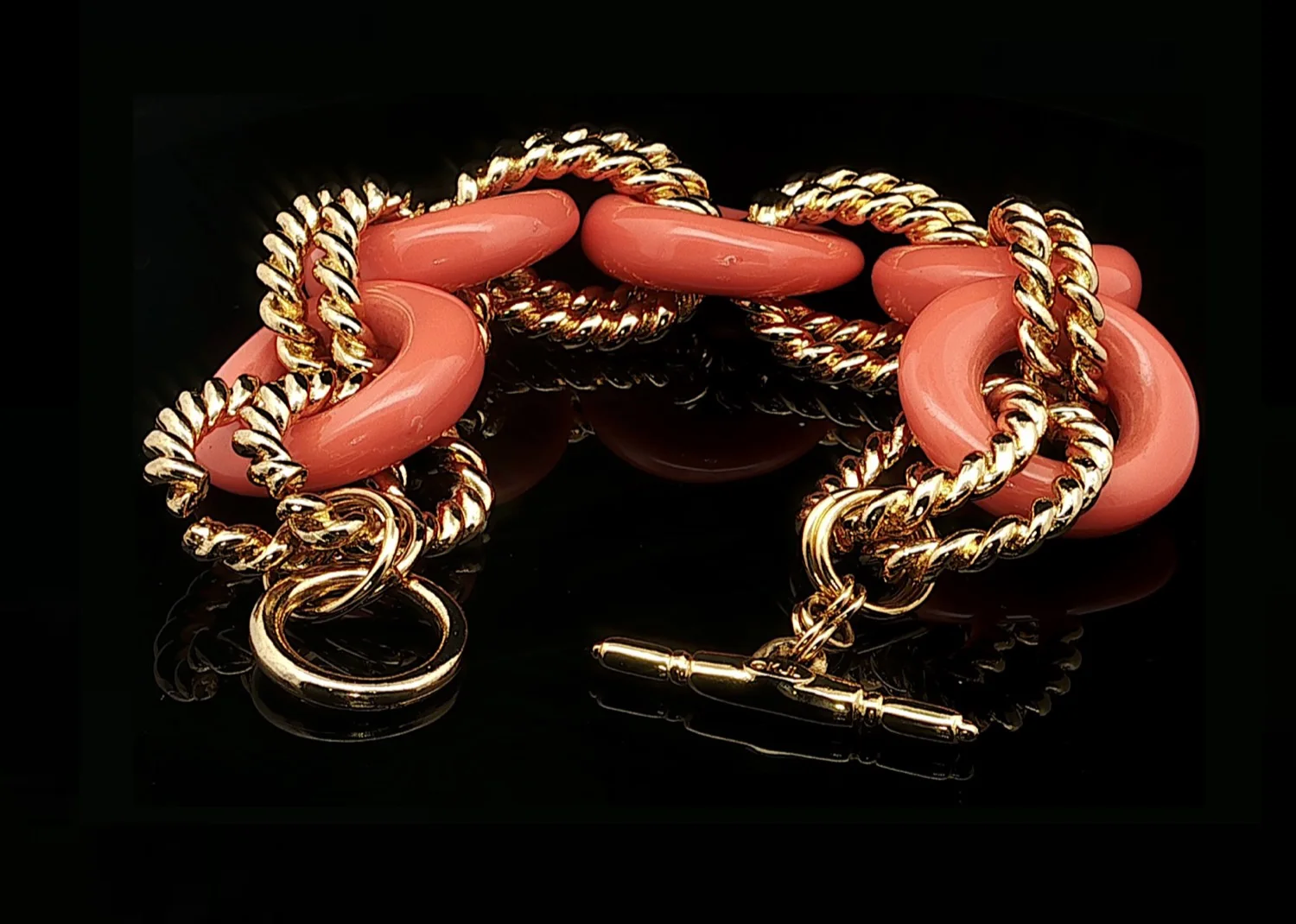 Kenneth Jay Lane faux coral & gold tone link bracelet